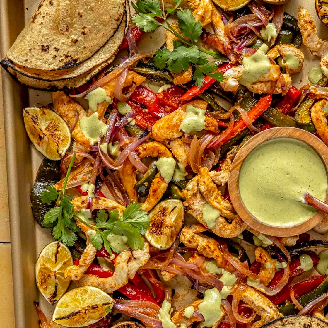 Easy Sheet Pan Chicken Fajitas with Citrus Marinade + Charred Jalapeño Crema (Gluten & Dairy-Free)