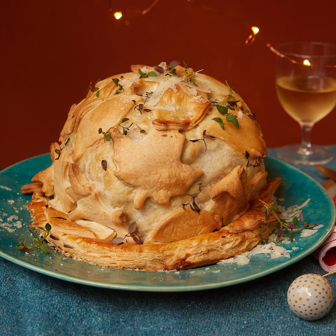 Whole roast cauliflower wellington with cheese sauce