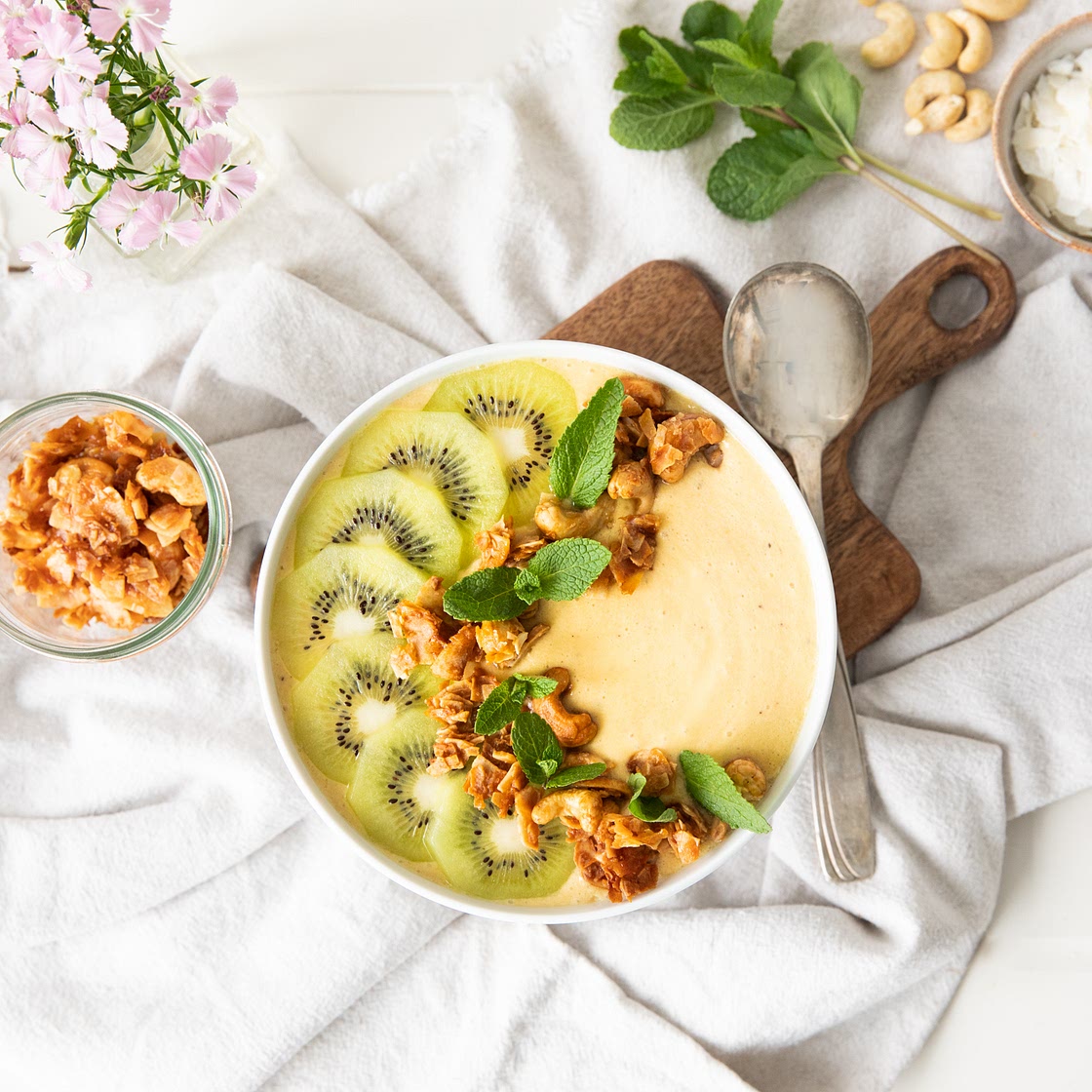 Honey-melon smoothie bowl with coconut granola