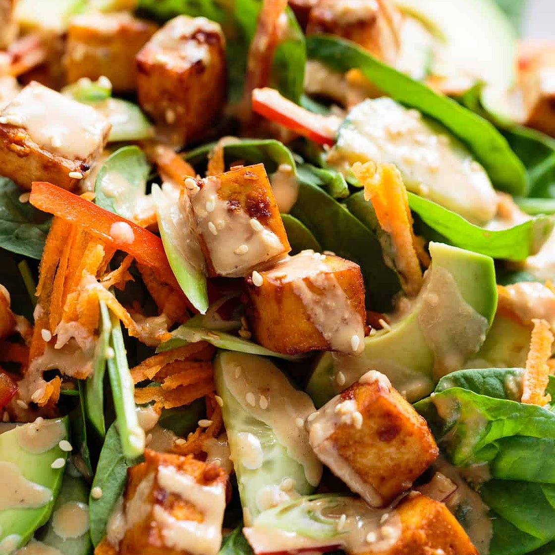 Marinated Tofu, Avocado, and Spinach Salad with Creamy Toasted Sesame & Soy Dressing