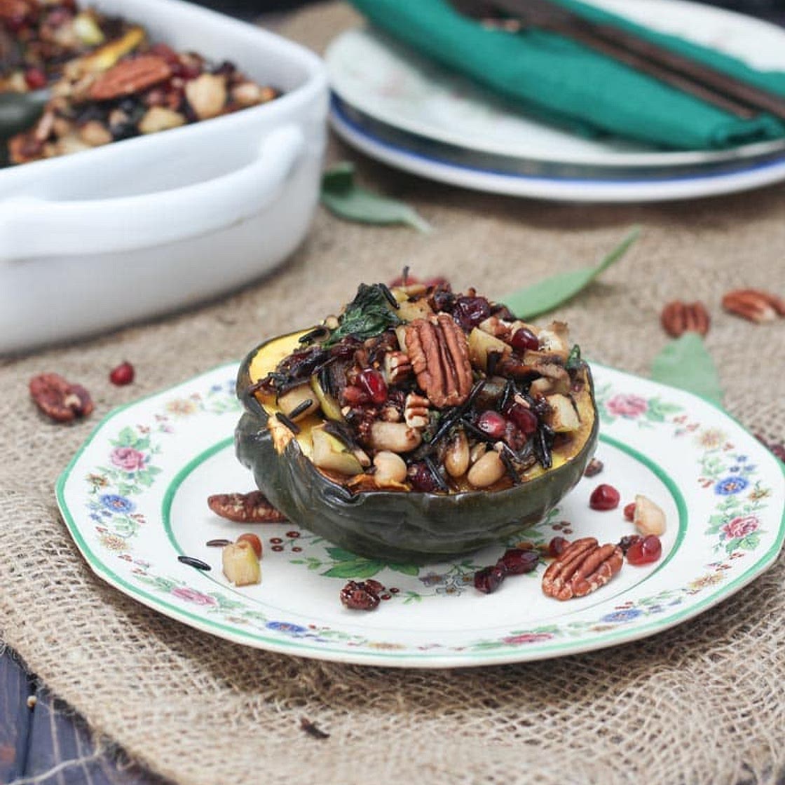 Vegan Stuffed Acorn Squash with Wild Rice, Apples and Caramelized Onions