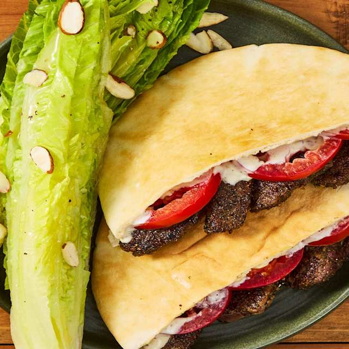 Garlicky Bavette Steak Pitas with Tomato, Lemony Wedge Salad & Almonds
