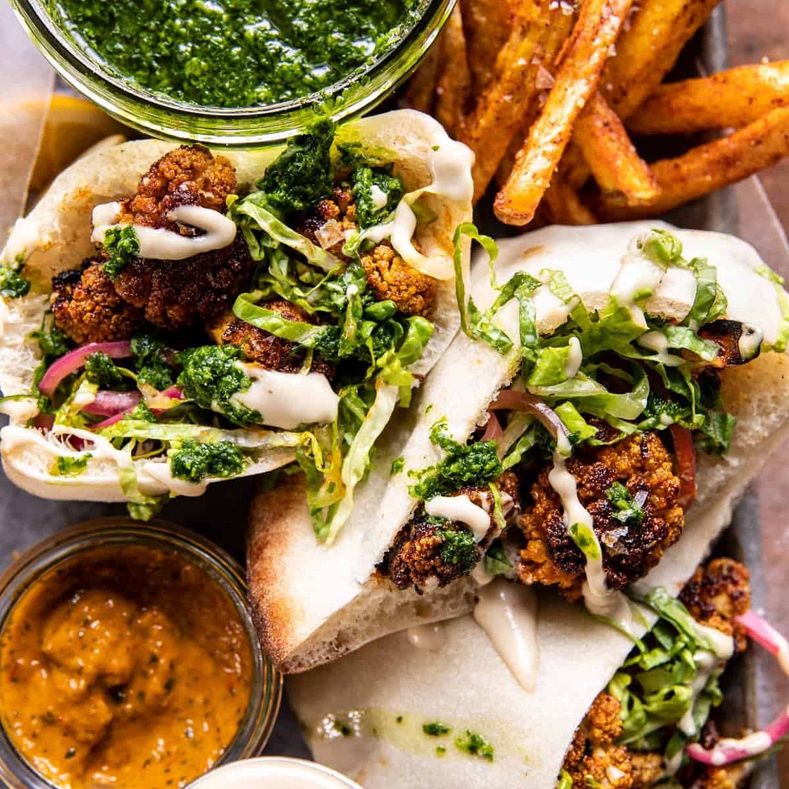 Roasted Cauliflower Pitas with Zhug and Garlic Tahini