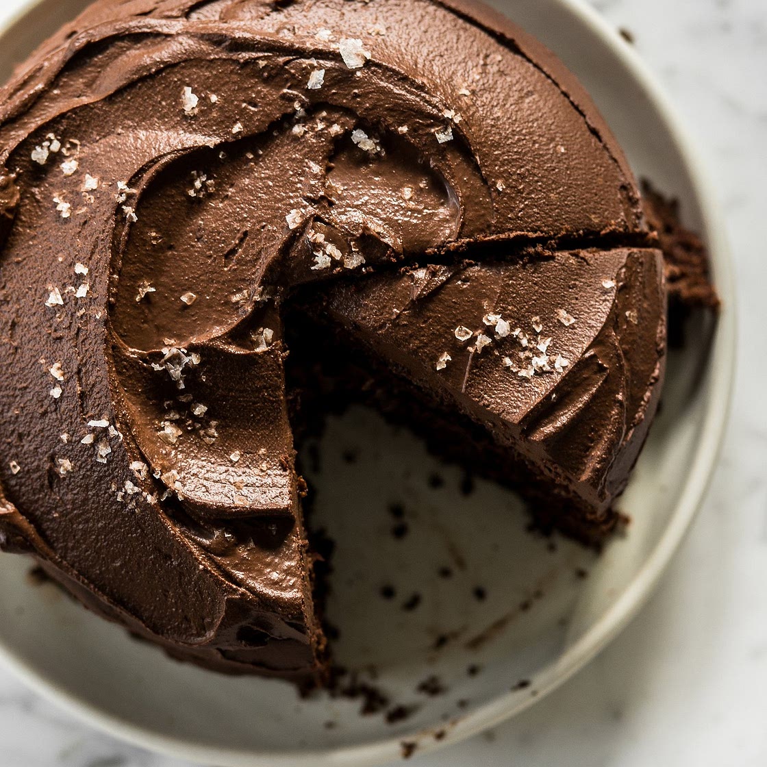 Vegan chocolate cake with maple filling and dark chocolate ganache
