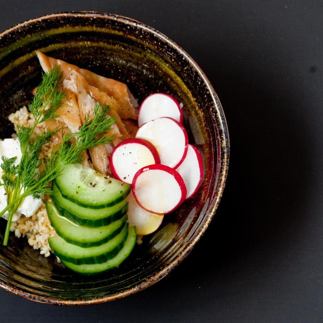 Smoked mackerel, radish, cucumber, dill and bulgur wheat grain bowl
