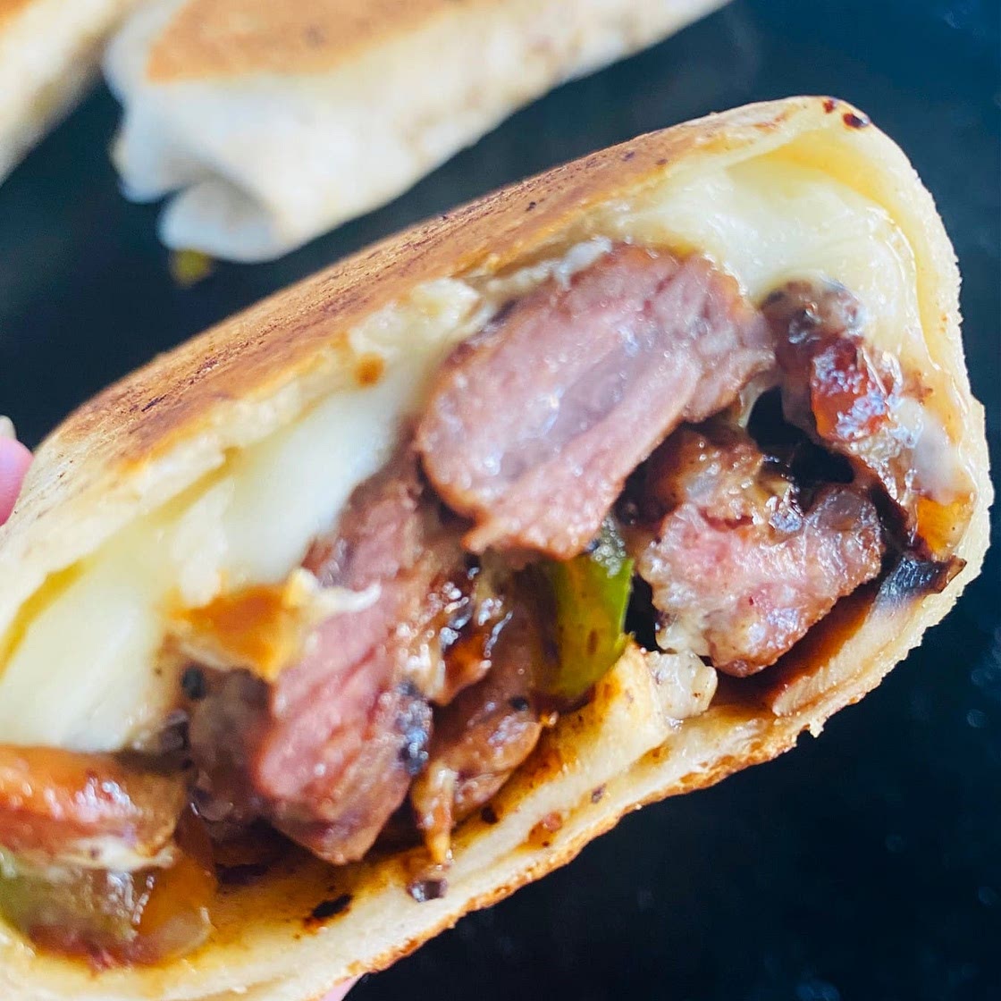 Blackstone Philly Cheesesteak Burritos
