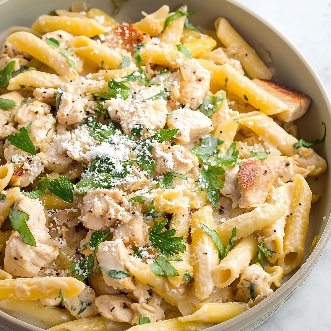 tender chicken with creamy garlic pasta