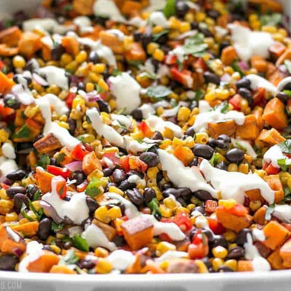 Roasted Sweet Potato Rainbow Salad with Lime Crema