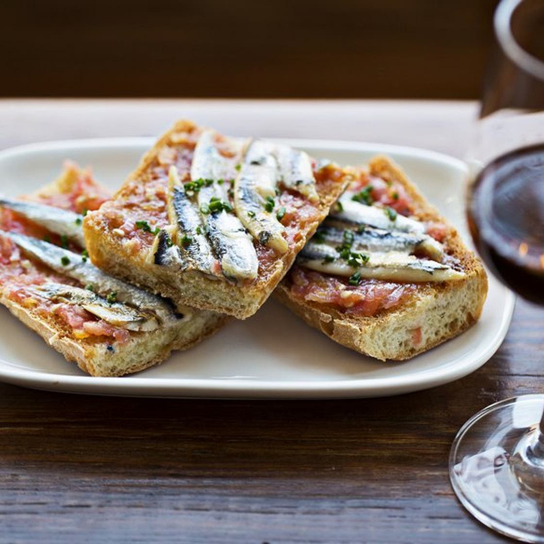 Anchovies on toast with tomato