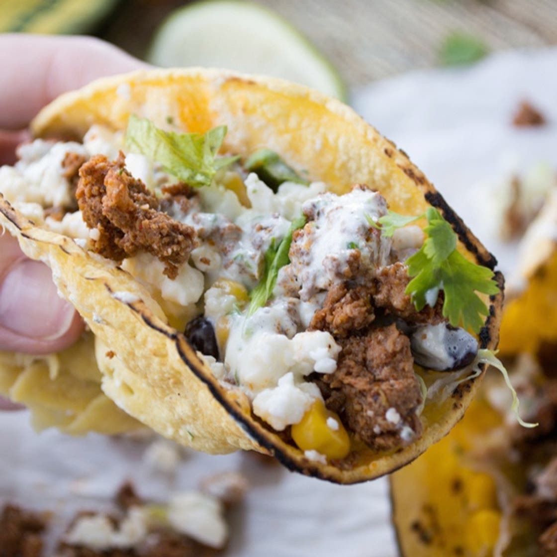 Chorizo Tacos {with Black Bean & Corn Salsa and Cilantro-Lime Crema}
