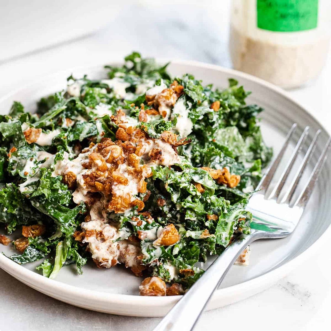 Kale Tahini Caesar Salad with Harissa Roasted Chickpeas