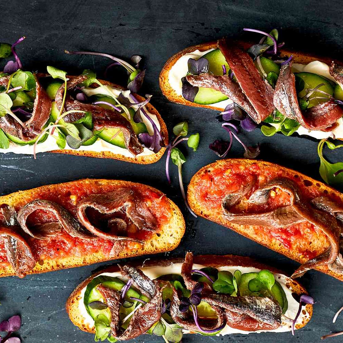 Anchovy Toasts with Fresh Tomato Vinaigrette