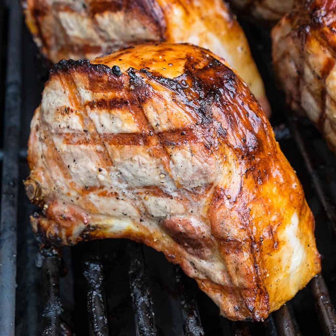 Grilled Double Cut Ribeye Pork Chops With Rosemary, Honey, and Lemon Glaze