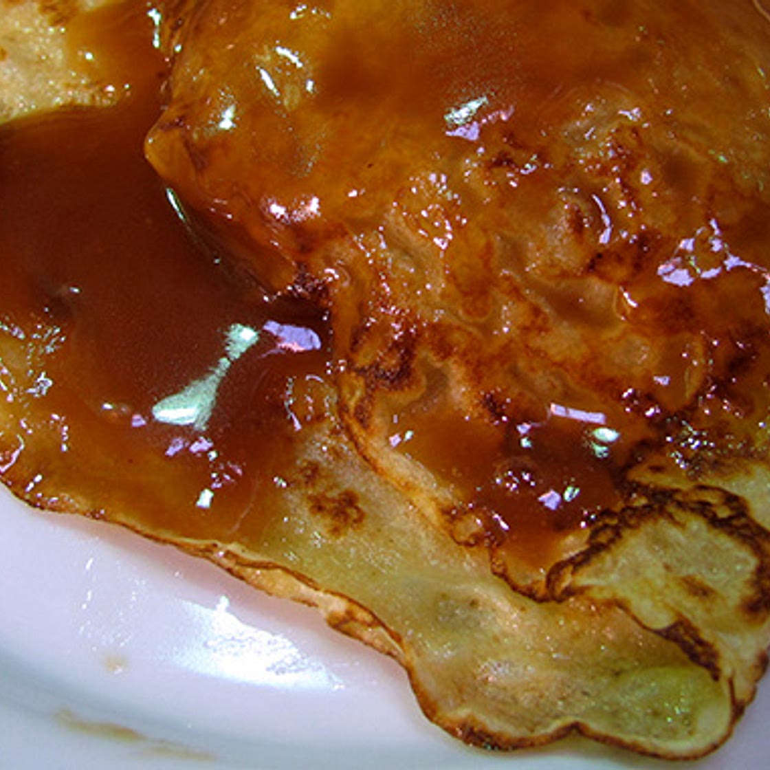 Apple-filled crepes with caramel sauce!