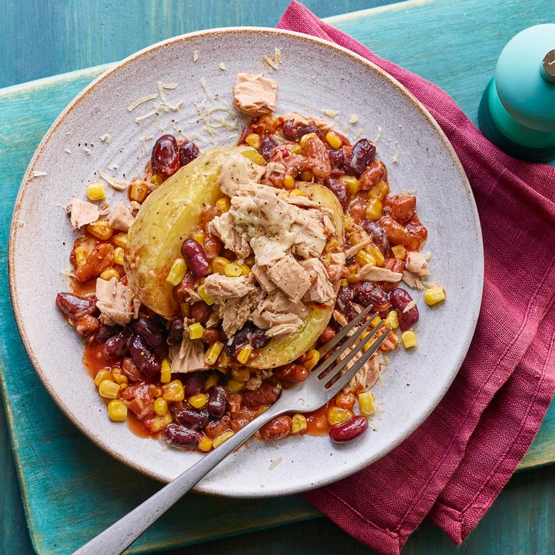Microwave jacket potato with tuna and spicy beans