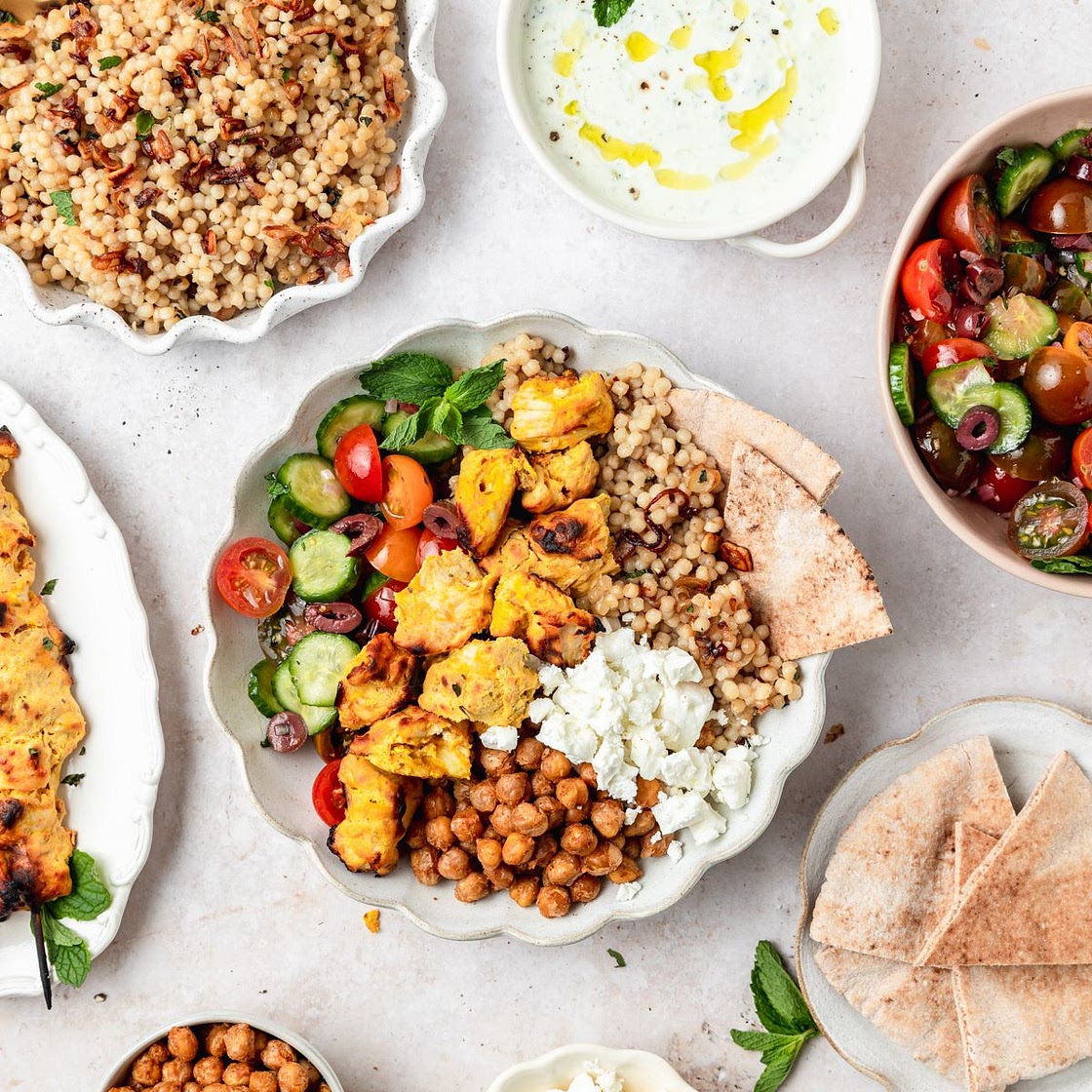 Greek Chicken Bowls with Toasted Pearl Couscous