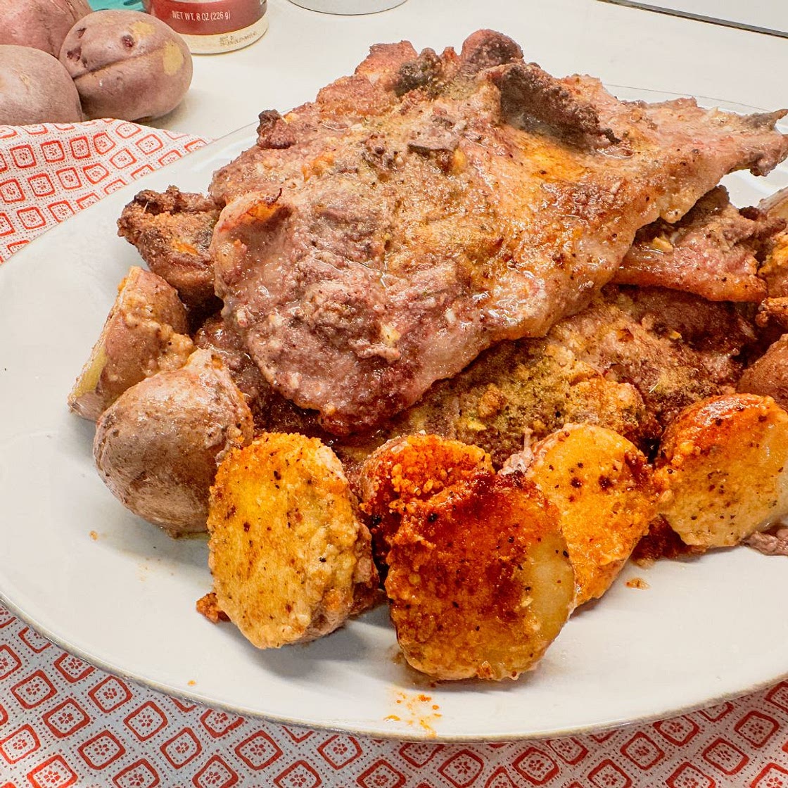 Parmesan Crusted Potatoes and Pork Steak Sheet Pan Meal