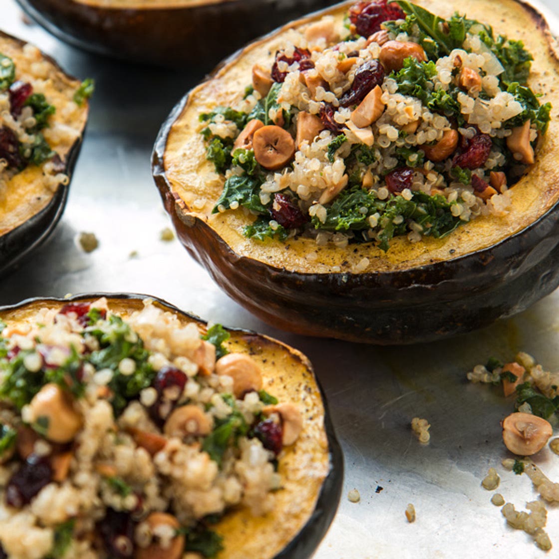Stuffed Acorn Squash with Hazelnuts, Quinoa, and Kale