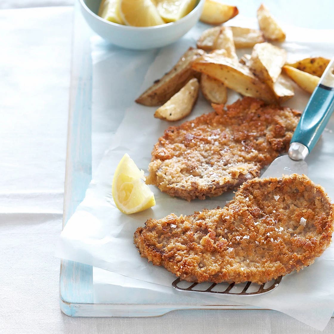 Oven-baked chicken schnitzel with spicy wedges