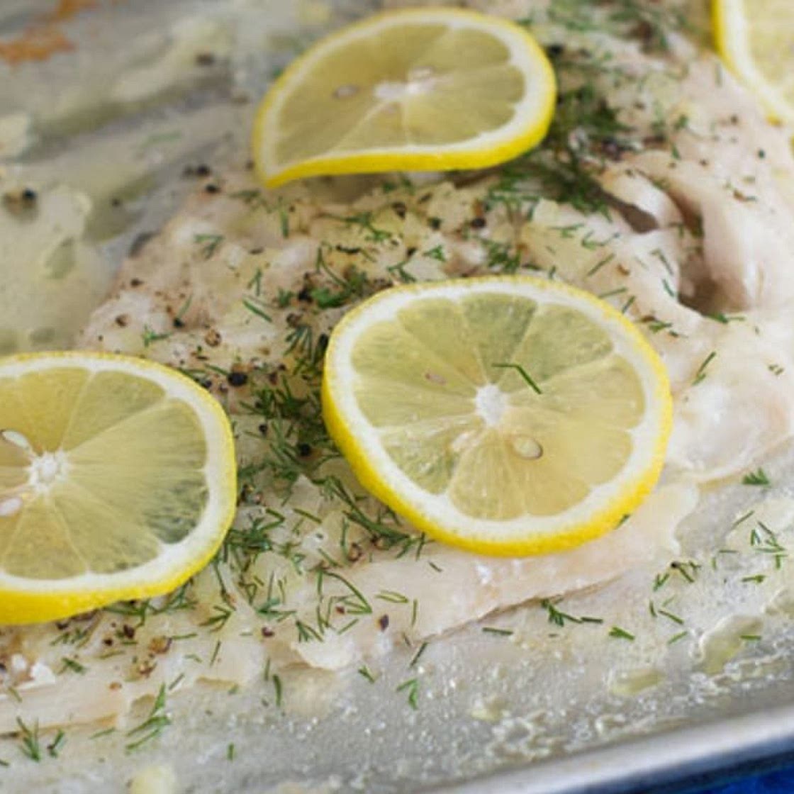 Baked Haddock with Onions, Herbs and Lemon