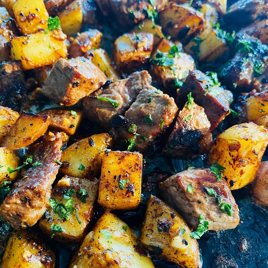 Blackstone Garlic Steak Bites and Potatoes