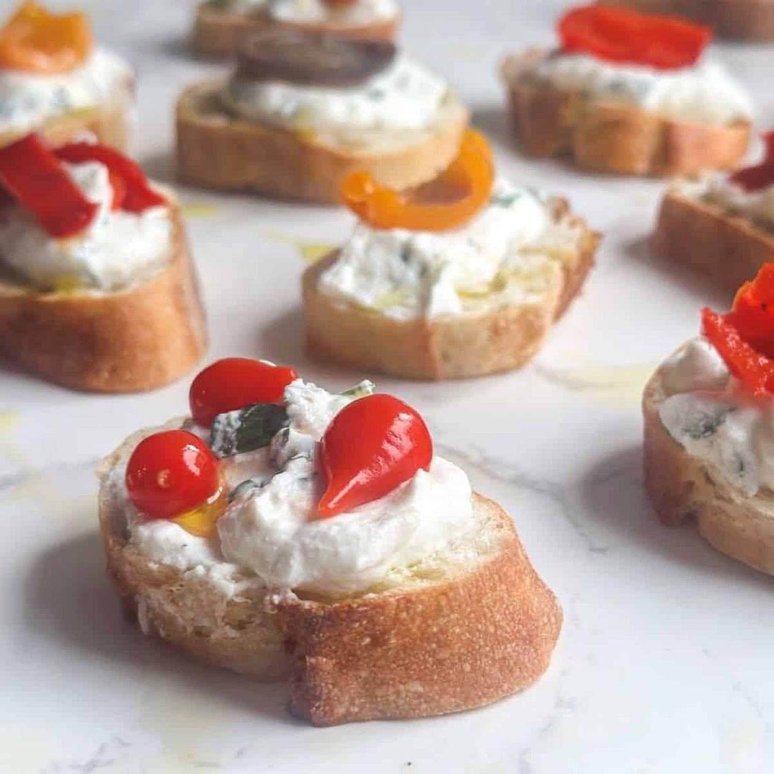 Whipped Ricotta Crostini with Antipasto Toppings