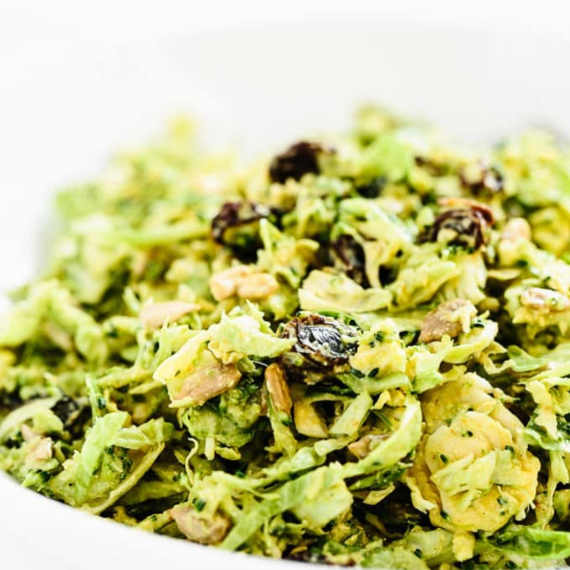 Broccoli & Brussels Sprout Detox Slaw with Creamy Curry Dressing