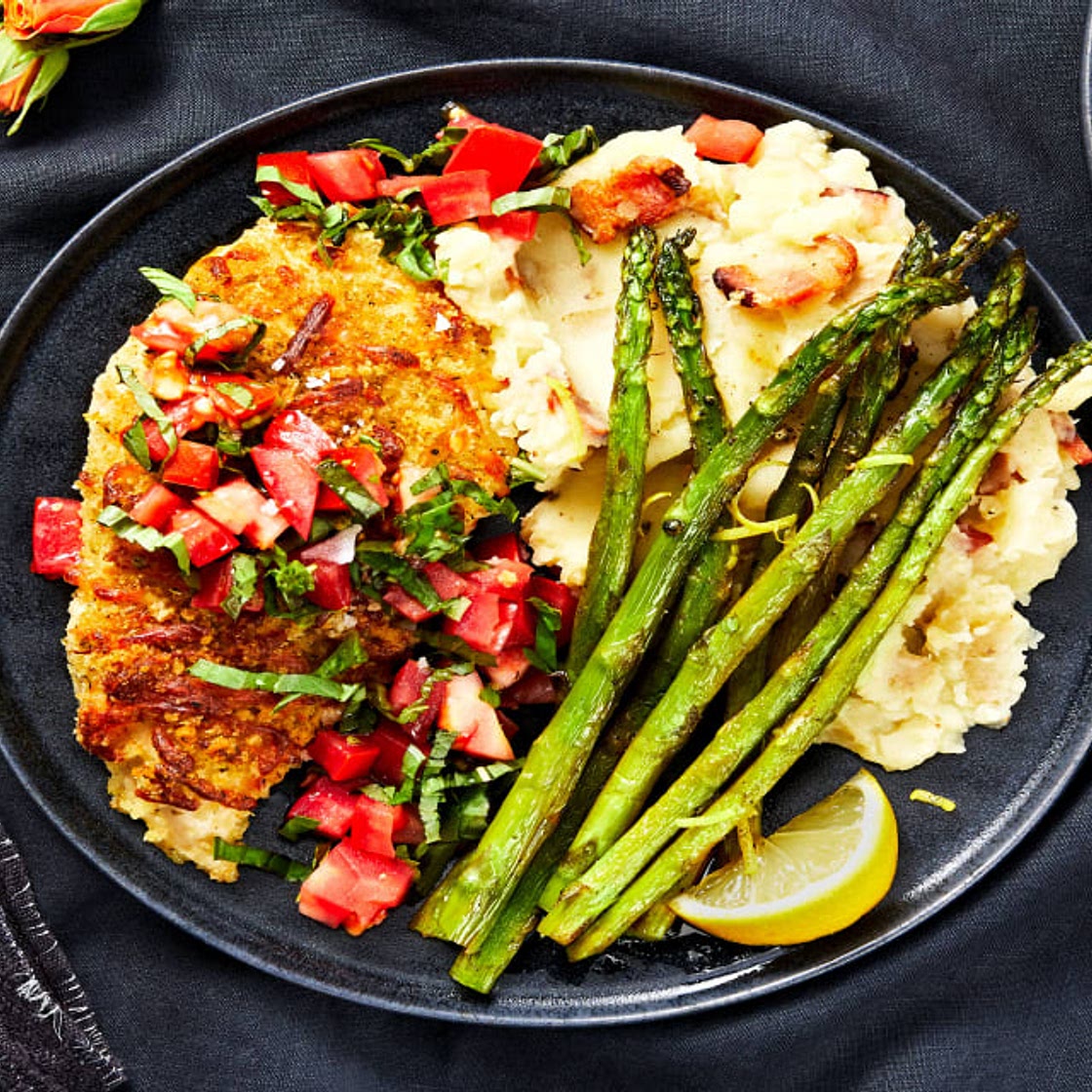 Bruschetta Chicken with a Crispy Mozzarella Crust, Bacon Mashed Potatoes, and Asparagus
