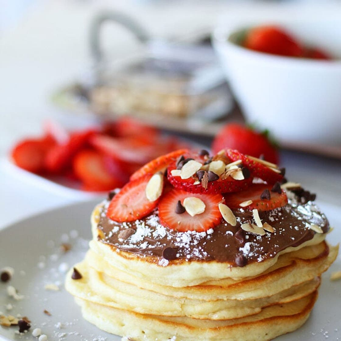 Fluffy Strawberry And Nutella Pancakes