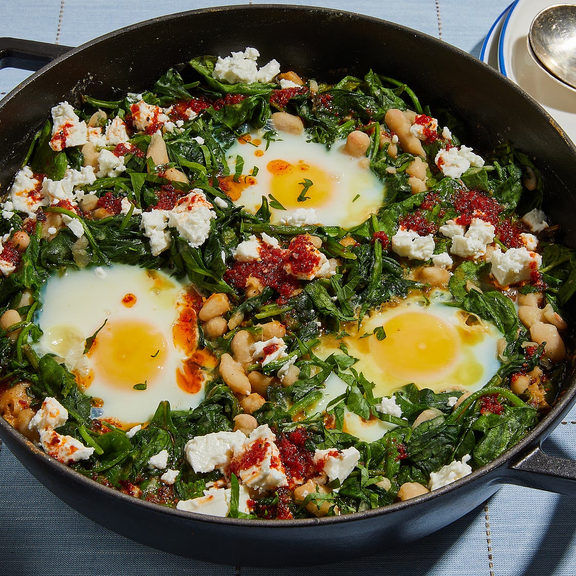 Green spinach shakshuka with white beans