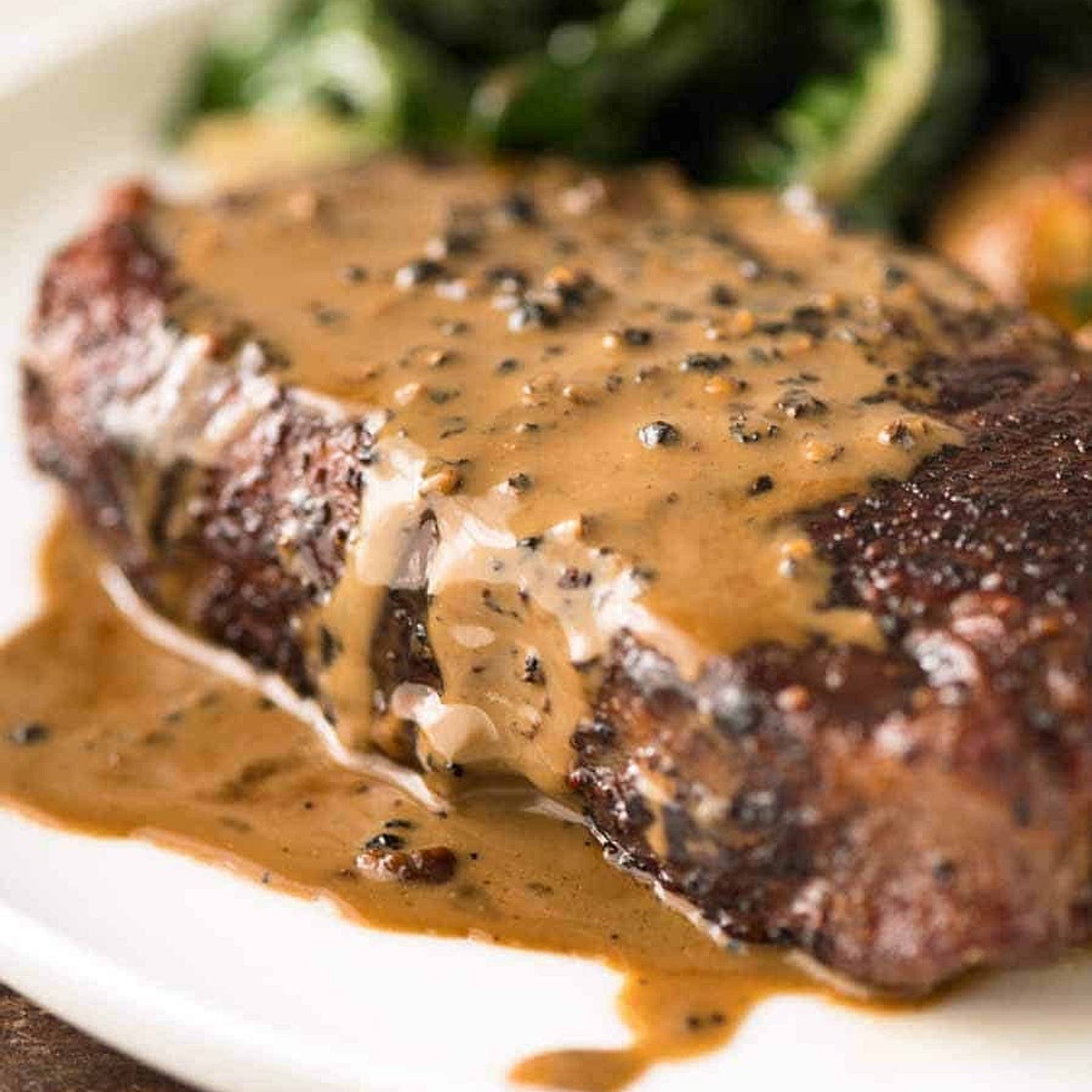 Steak with Creamy Peppercorn Sauce