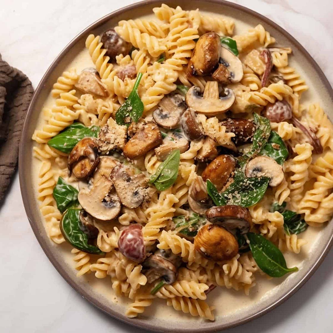 Spinach And Mushroom Pasta In Tahini Sauce