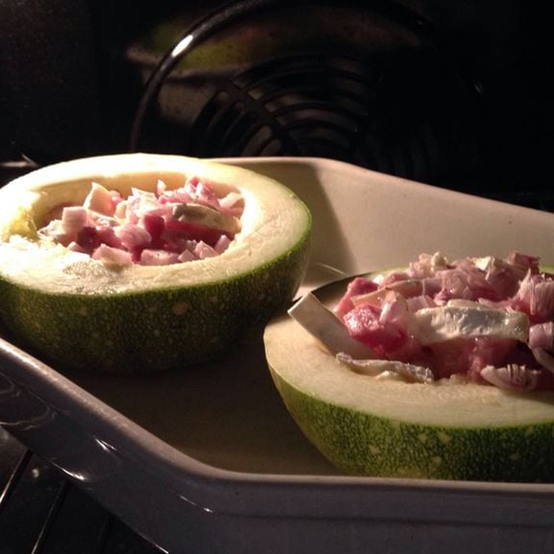 Courgette farcie aux fromages et lardons
