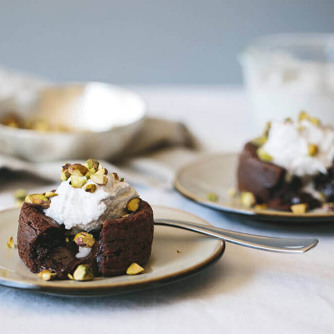 Molten Chocolate Cake with Coconut Whipped Cream and Pistachios (dairy-free, paleo)