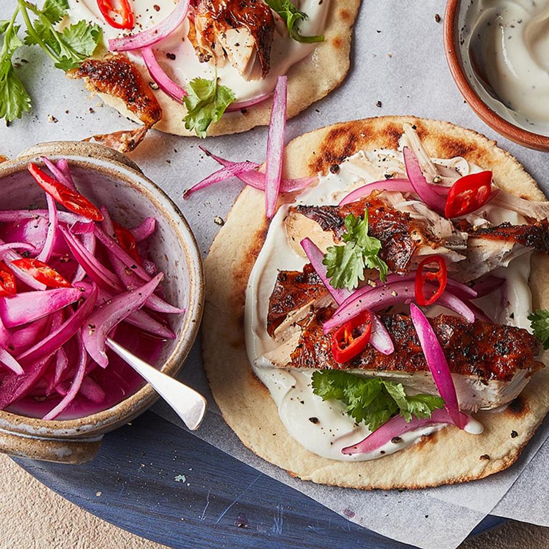 Roast harissa chicken with homemade flatbreads