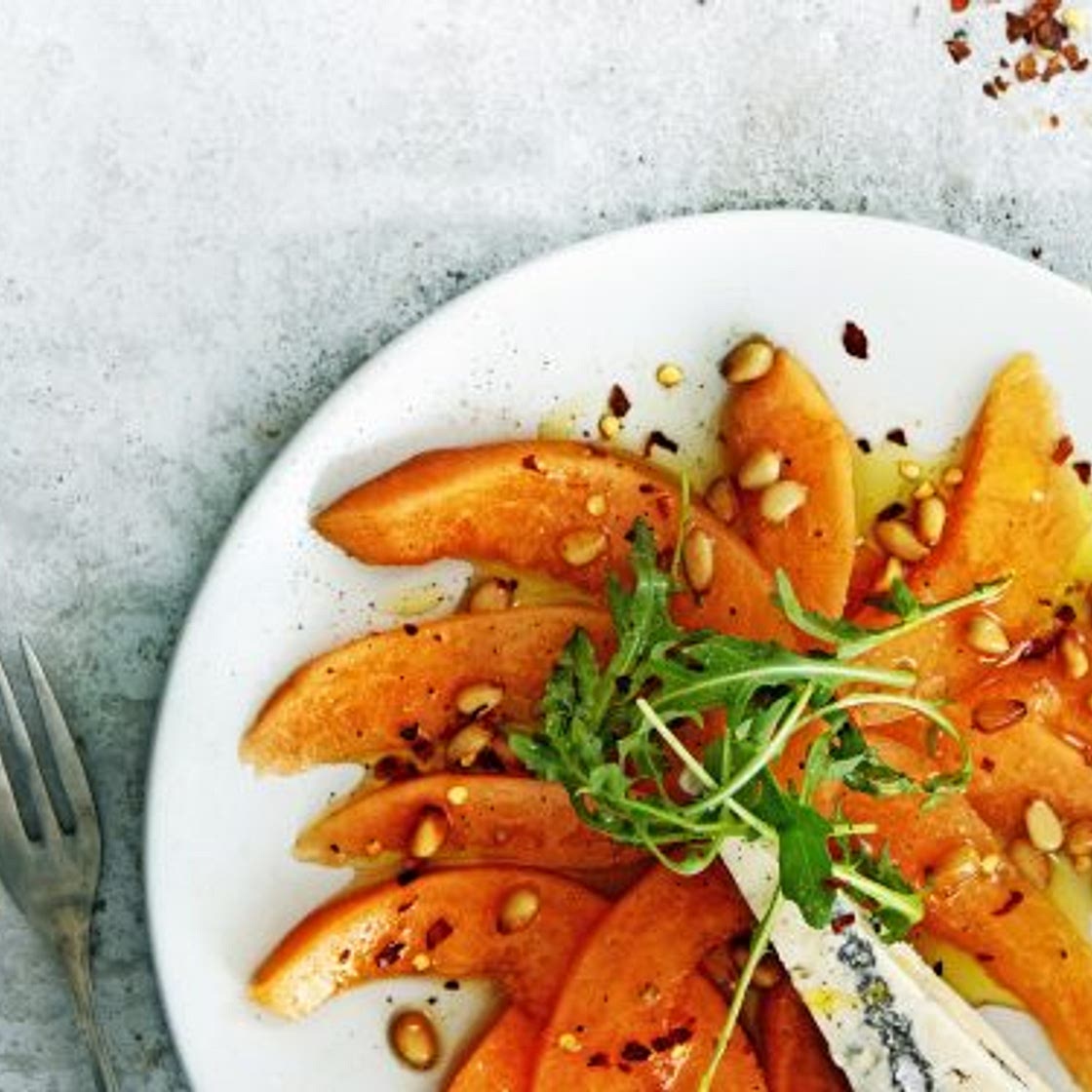 meloencarpaccio met gorgonzola en rucola