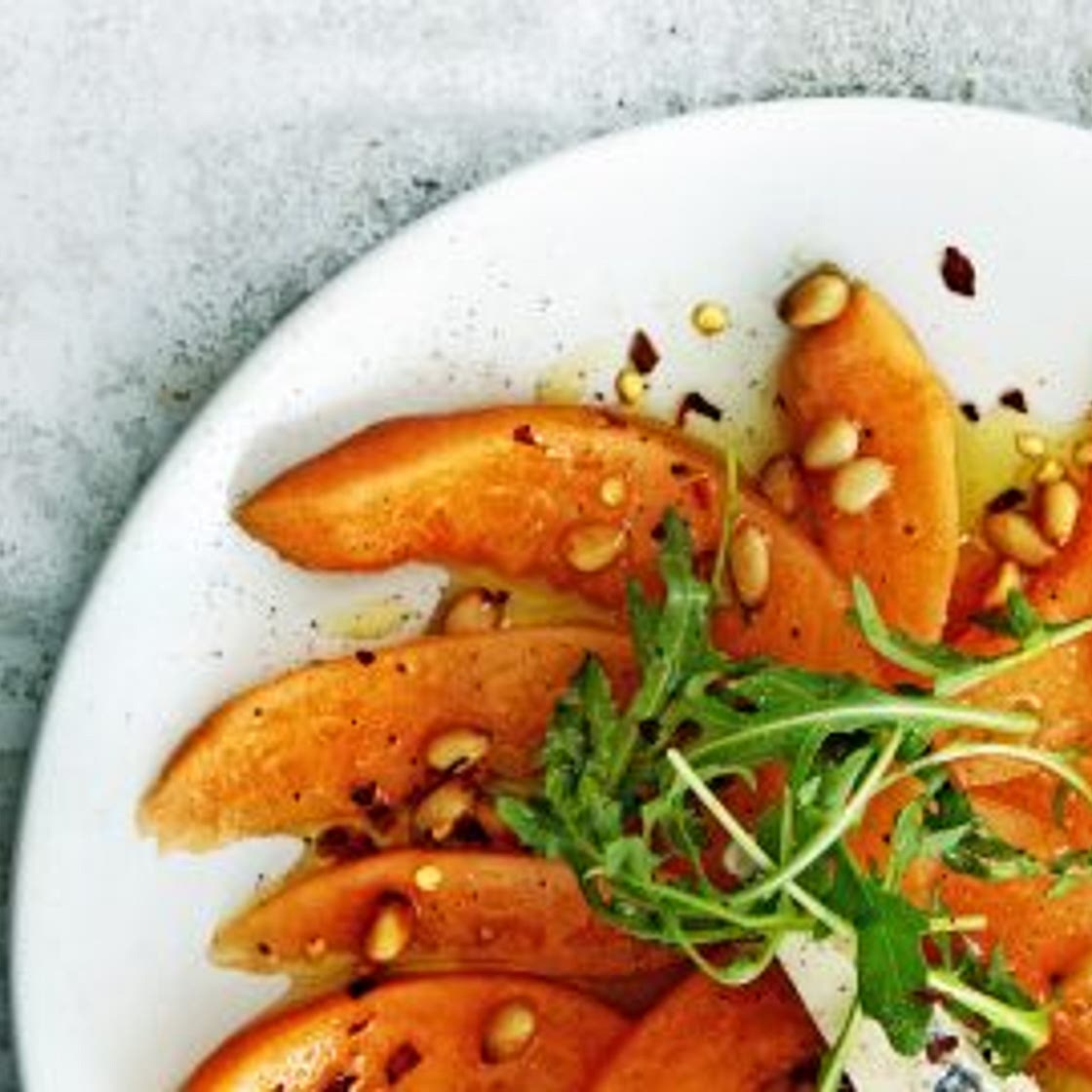 meloencarpaccio met gorgonzola en rucola