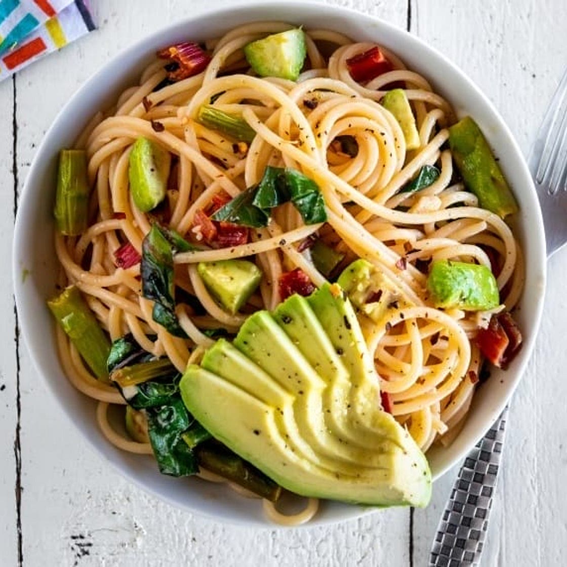 Spaghetti with Asparagus, Wilted Greens, and Avocado