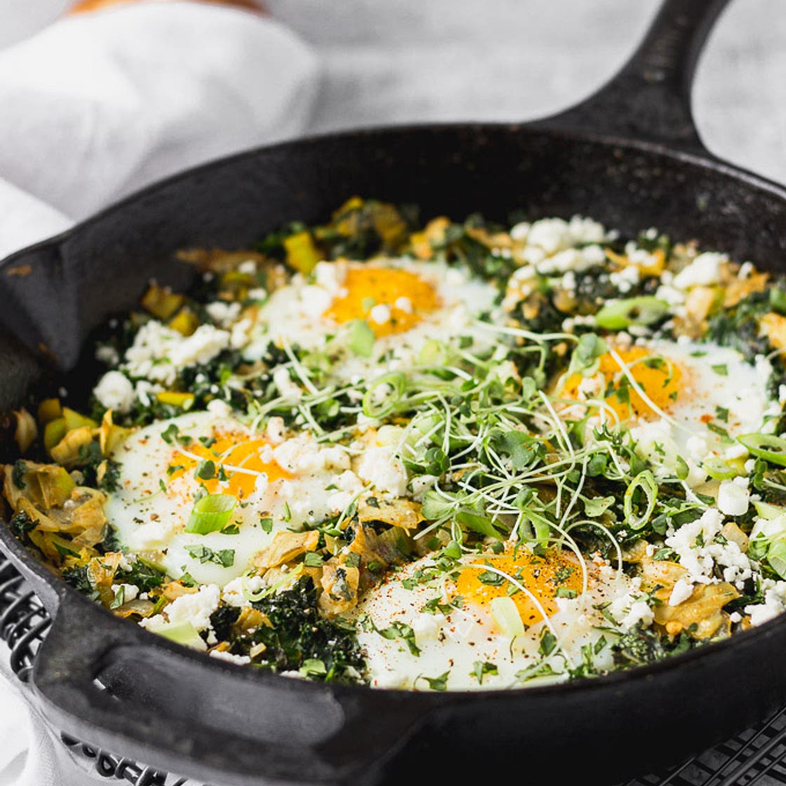 Green Shakshuka with Kale, Leeks, Artichokes, & Feta