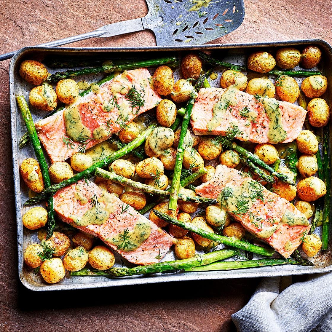 Sea trout, new potato and asparagus traybake with dill mustard sauce