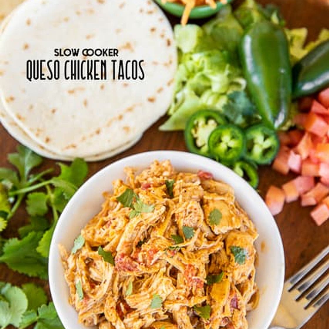 Slow Cooker Queso Chicken Tacos