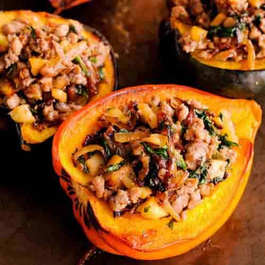 Sausage Stuffed Squash with Apples, Spinach and Caramelized Onions