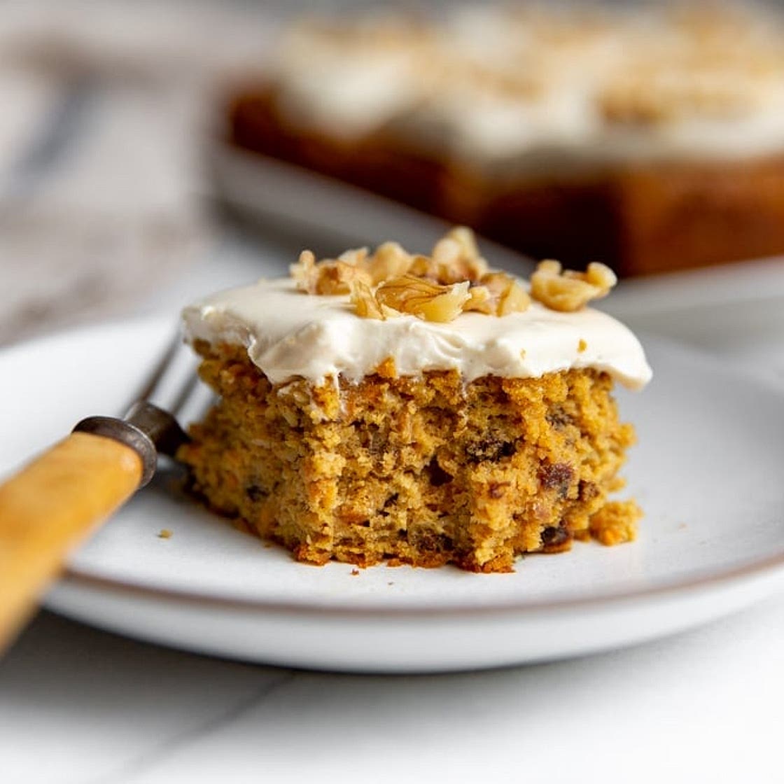 Gluten Free Carrot Cake with Maple Cream Cheese Frosting (Grain Free, Sugar Free, Vegan Option)