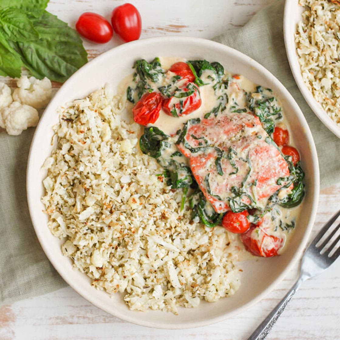 Salmon with Cauliflower Rice, Spinach, Tomatoes & Creamy Basil Sauce