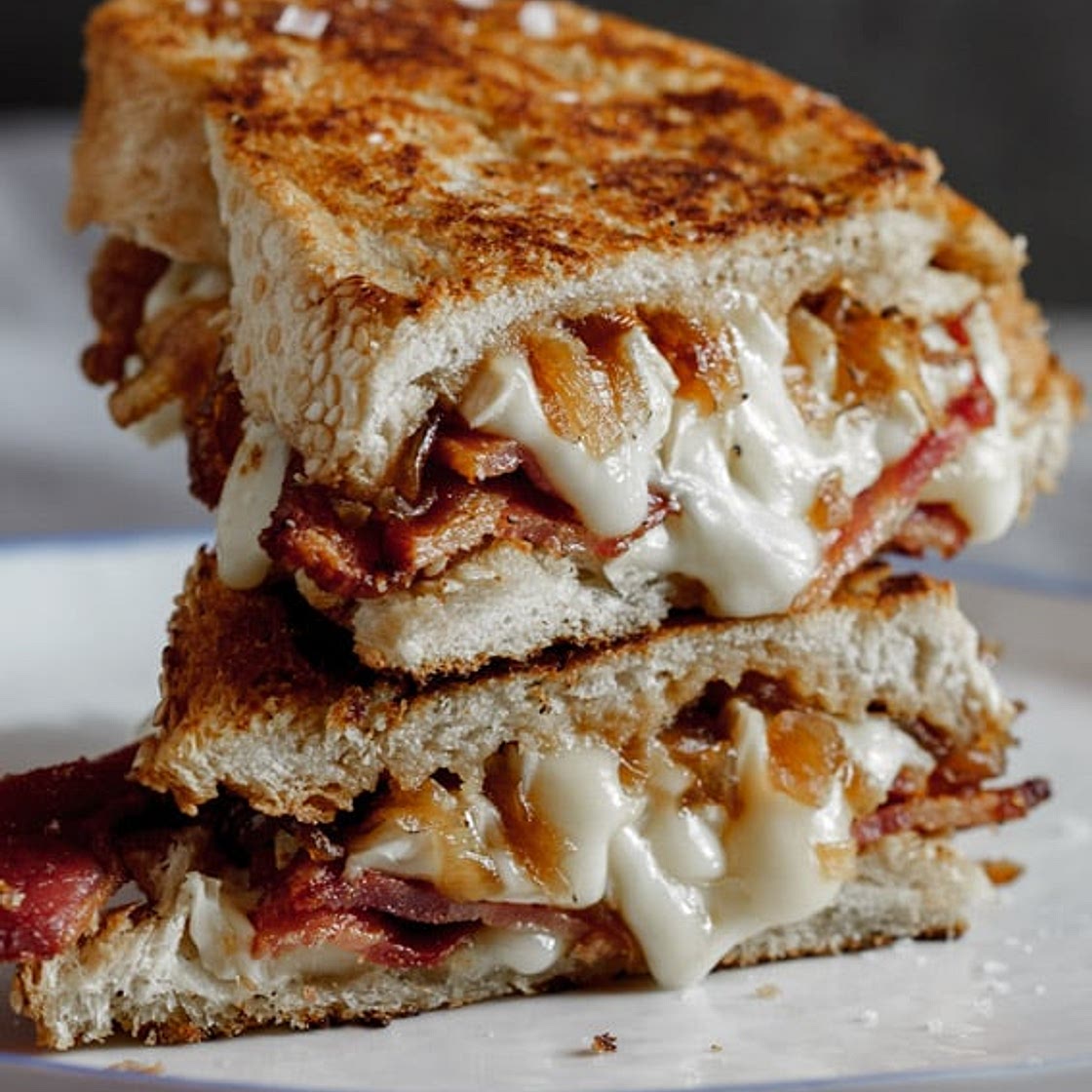 Crispy bacon & brie grilled cheese sandwich with caramelised onions