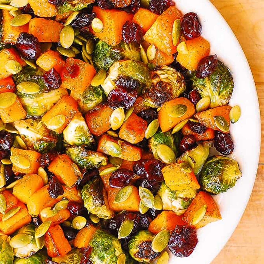 Roasted Brussels Sprouts Salad with Maple Butternut Squash, Pumpkin Seeds, and Cranberries
