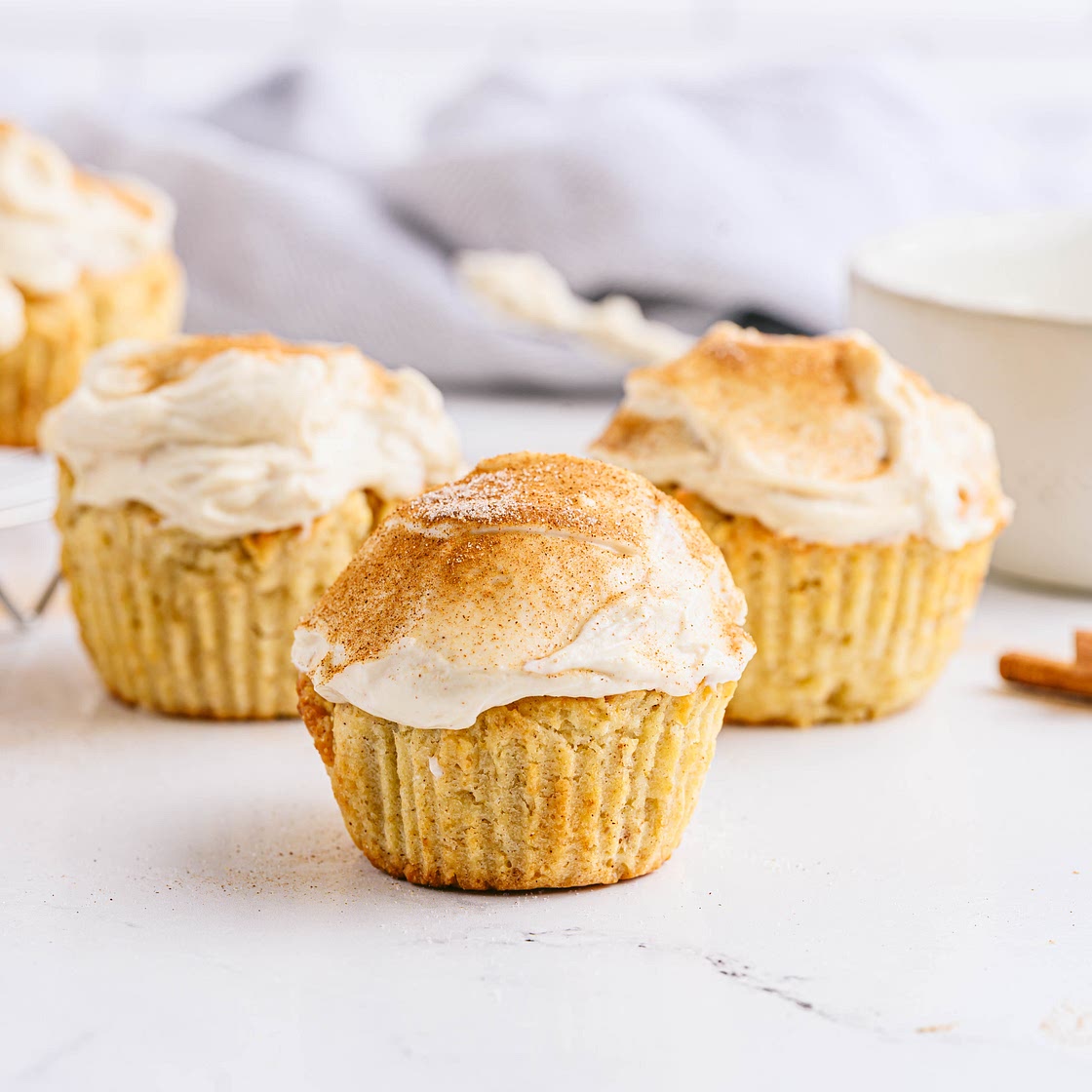 Snickerdoodle Muffins with Yogurt Frosting