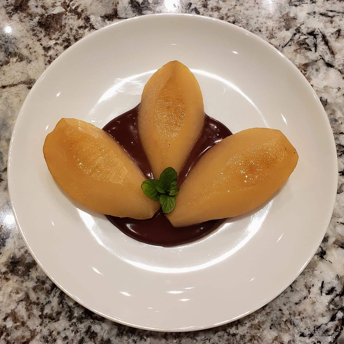 Poached pears with chocolate sauce