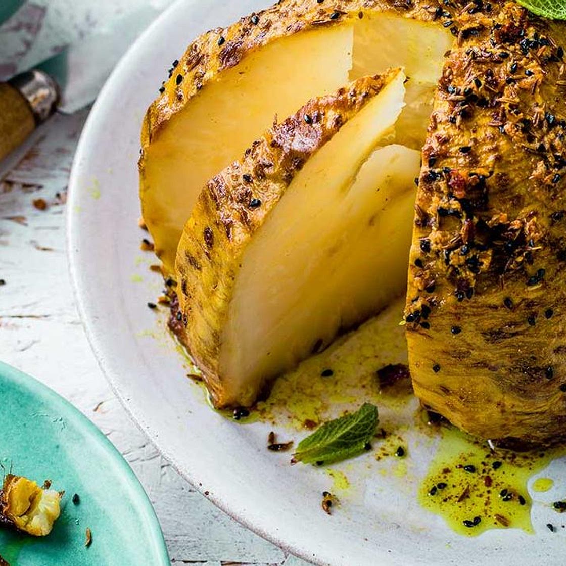 Slow-roast spiced whole celeriac with raita