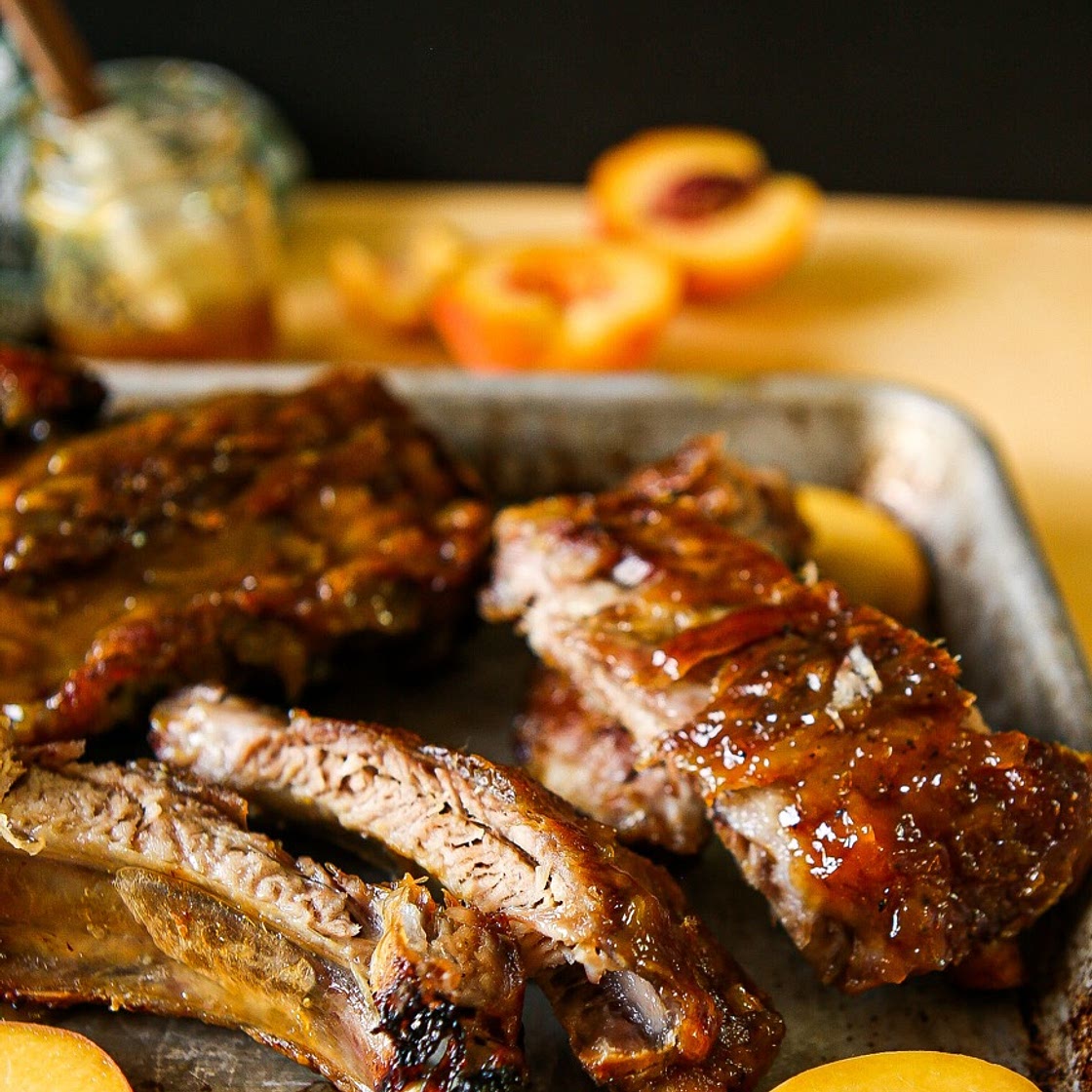 Slow cooked maple peach bourbon back ribs